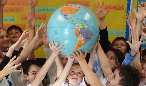 Kids Holding A Globe